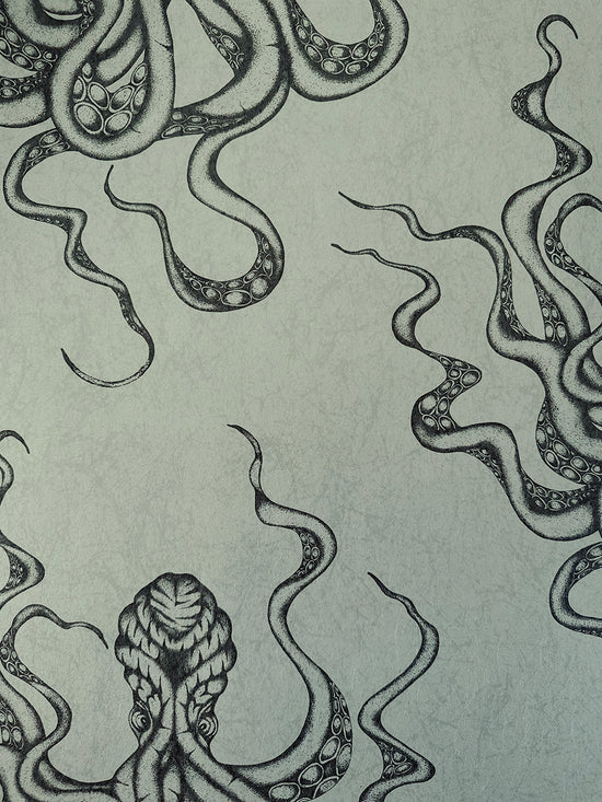 Gunmetal and green detail showing Kraken’s swirling tentacles on hand-illustrated wallpaper.