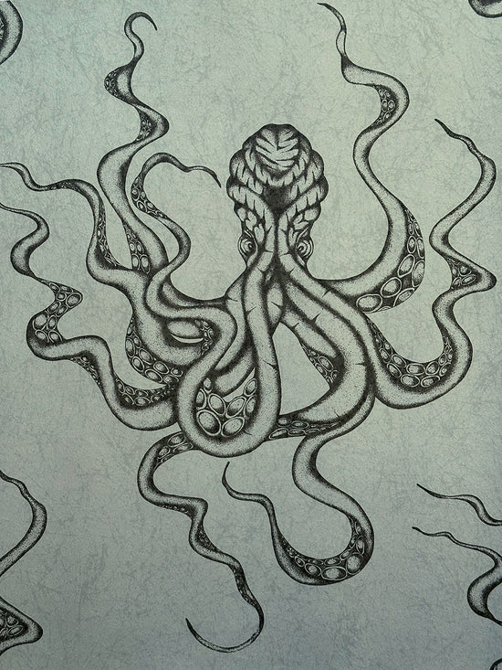 Hand-drawn Kraken detail on green-grey shimmering background, ideal for maximalist and coastal interiors.