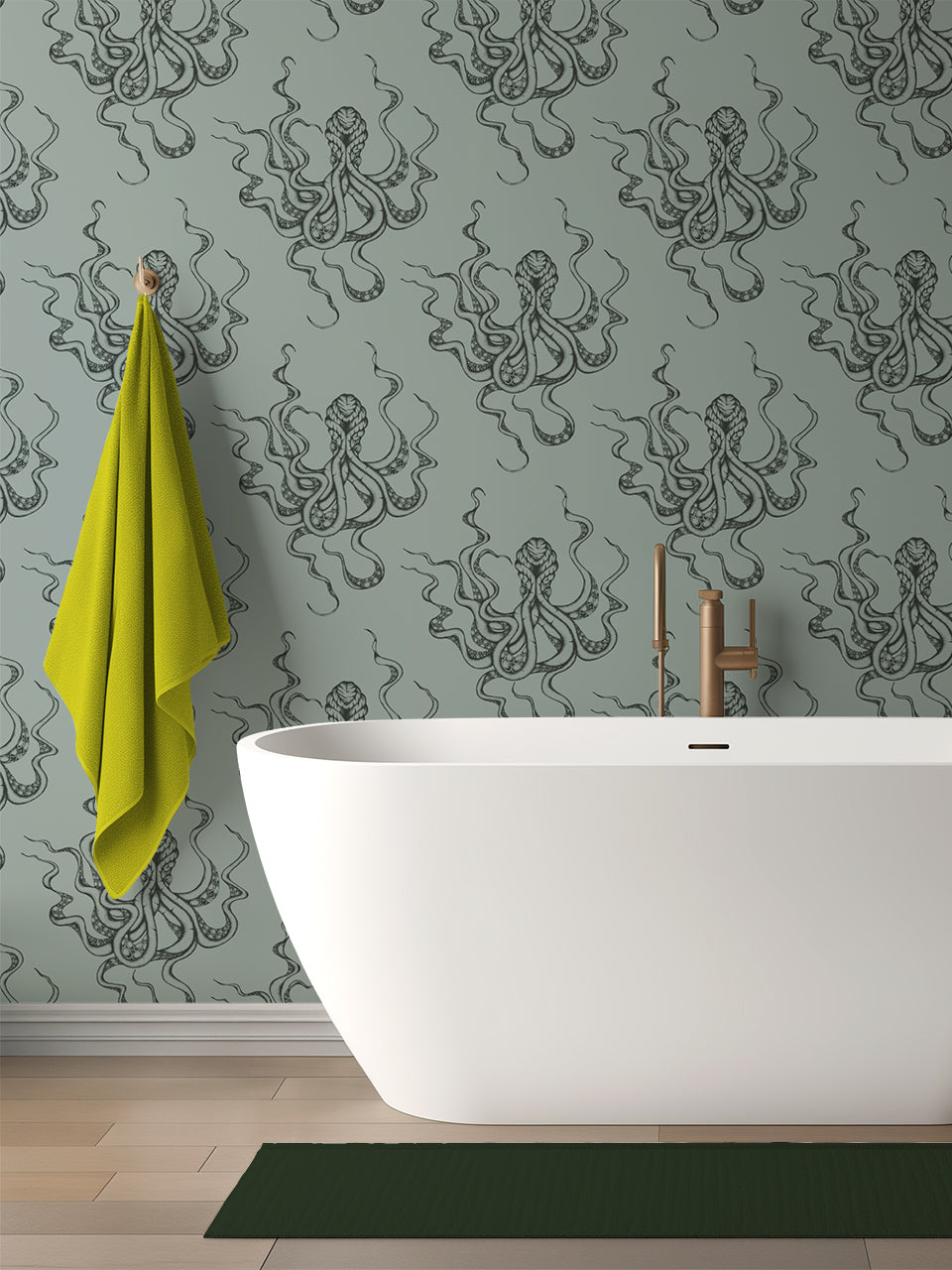 Kraken Steel wallpaper in bathroom setting with freestanding bath; moody green-grey tones with shimmering octopus design.