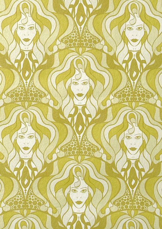 Sample sheet of Lady Marmalade wallpaper in brass shimmering tones and biba-style face motifs.