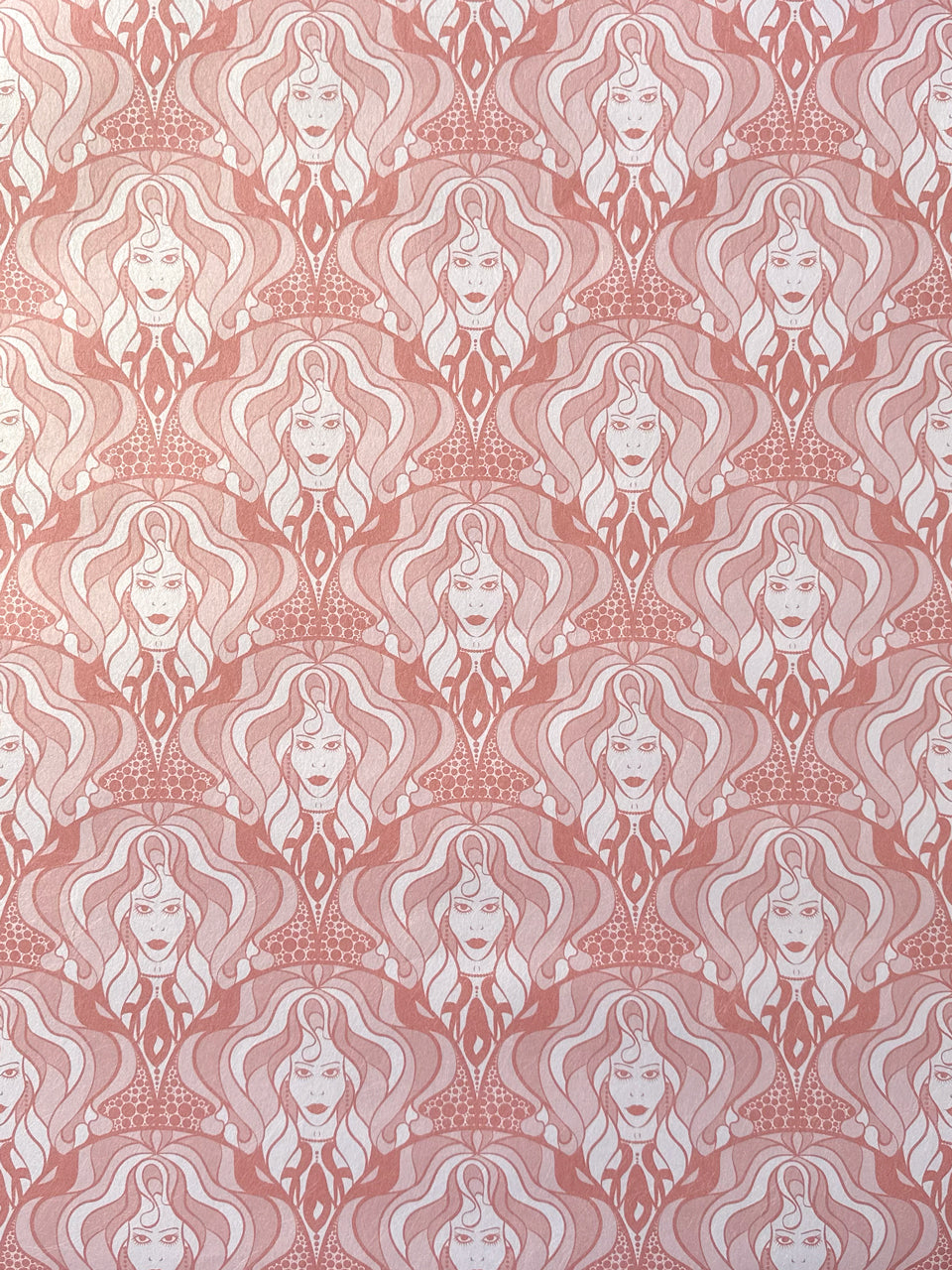 Blush-toned wallpaper with shimmering rose gold finish and Art Nouveau-inspired 70s design.