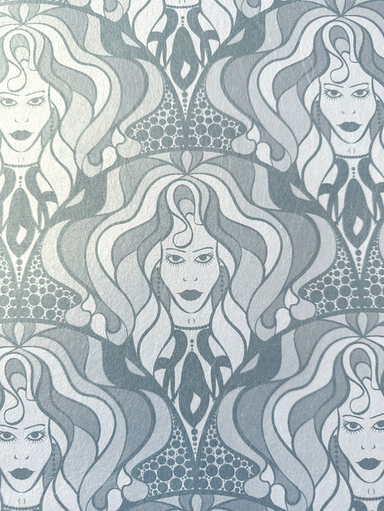 Biba-inspired 1970s wallpaper design in shimmering grey with bold feminine detailing.