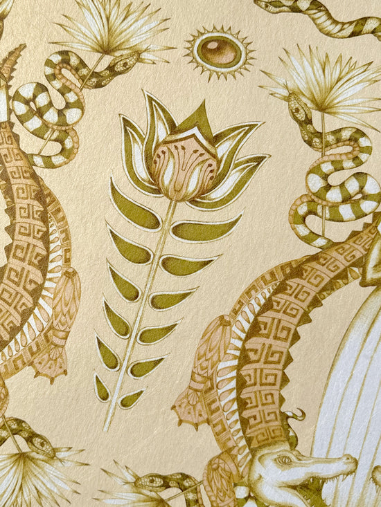 Close-up of floral detailing on the opulent Nefertiti Cream wallpaper with gold parchment finish.