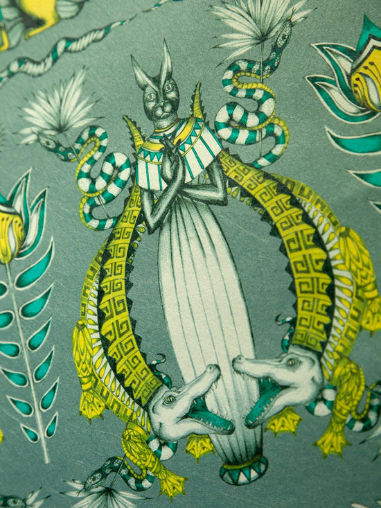 Close-up of crocodiles and emerald green snakes on luxurious gold-accented Nefertiti Green Grey wallpaper.