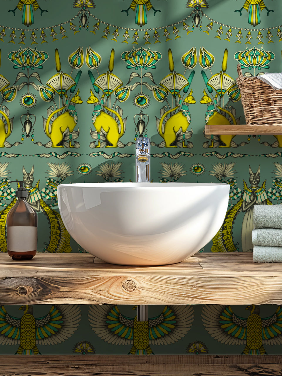 Feature wall in guest bathroom with luxurious Nefertiti wallpaper in gold, ivory, and eucalyptus tones.