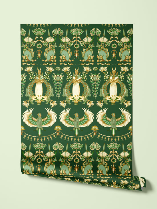 Nefertiti Green wallpaper roll hanging to show its art deco luxury pattern and gold sheen.