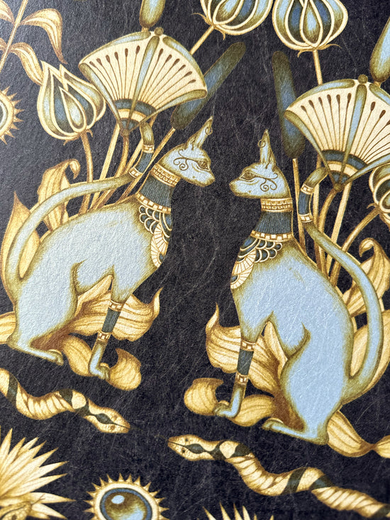 Sacred duck egg blue cat with snake and lotus flowers in close-up of Nefertiti Navy wallpaper.