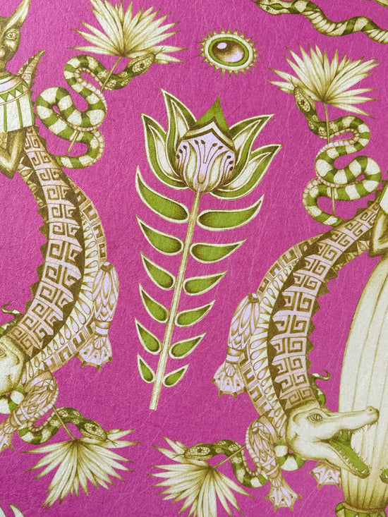 Artistic close-up of olive green papyrus flower and desert flora from Nefertiti Pink wallpaper.