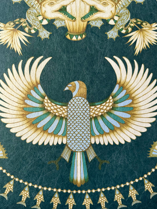 Bird and fish details in duck egg and metallic gold on Egyptian deco-style wallpaper.