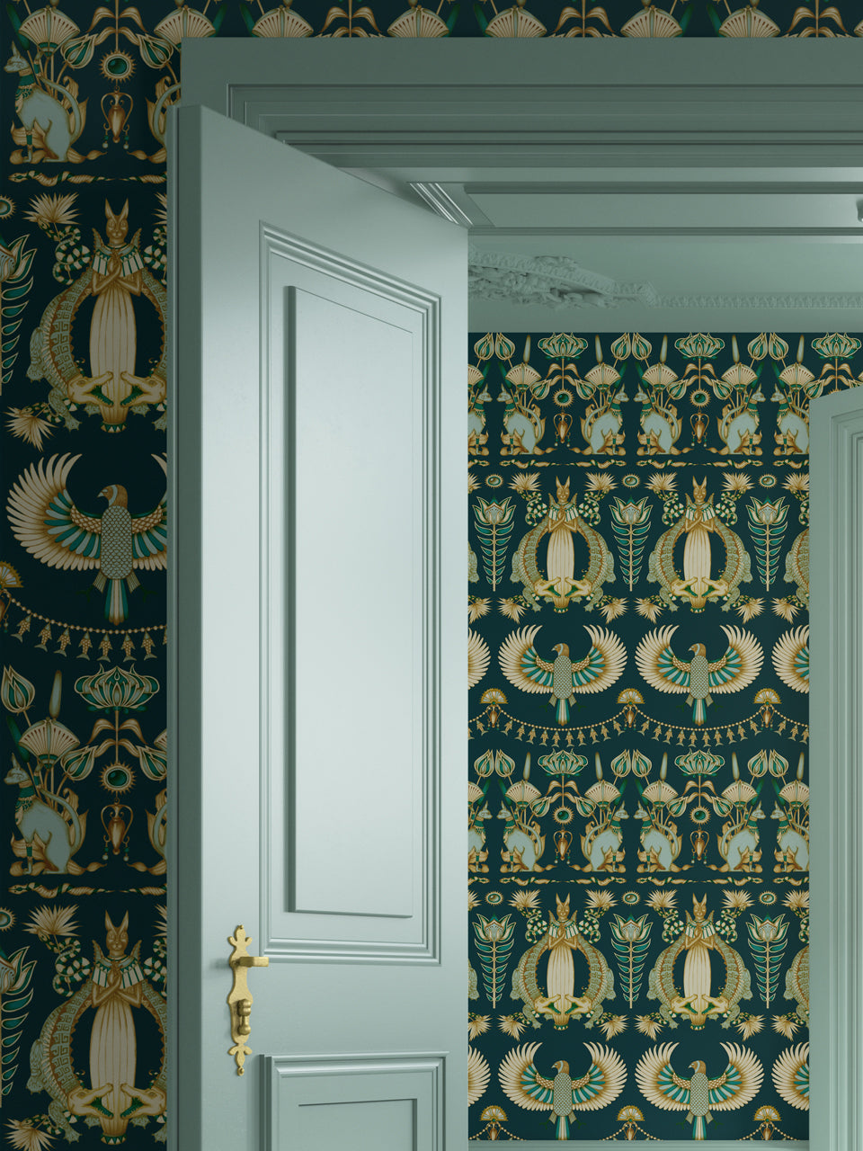 Maximalist bedroom wallpaper with designer Egyptian motifs and metallic gold detail.