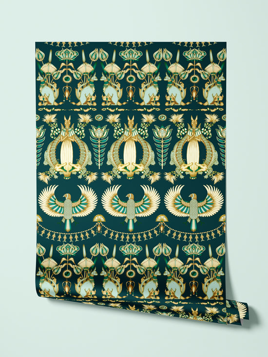 Rolled wallpaper with shimmering gold and ivory parchment-style Egyptian design.