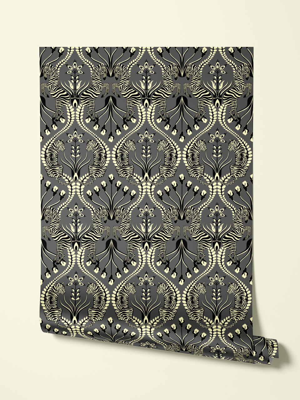 Hanging roll of Secret Garden Safari Black wallpaper with iridescent gold and folk floral design.