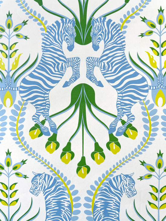 Full repeat of Secret Garden Safari Blue wallpaper with cottage floral patterns, blue zebras and tigers.