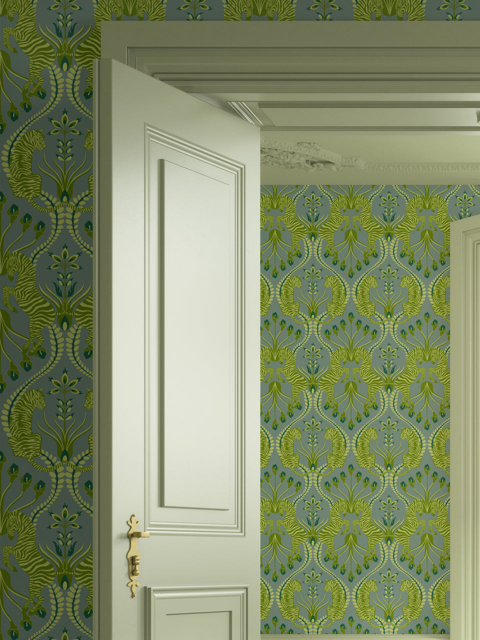 Bedroom styled with Secret Garden Safari Green wallpaper featuring vintage tiger and zebra pattern in rich earthy greens.