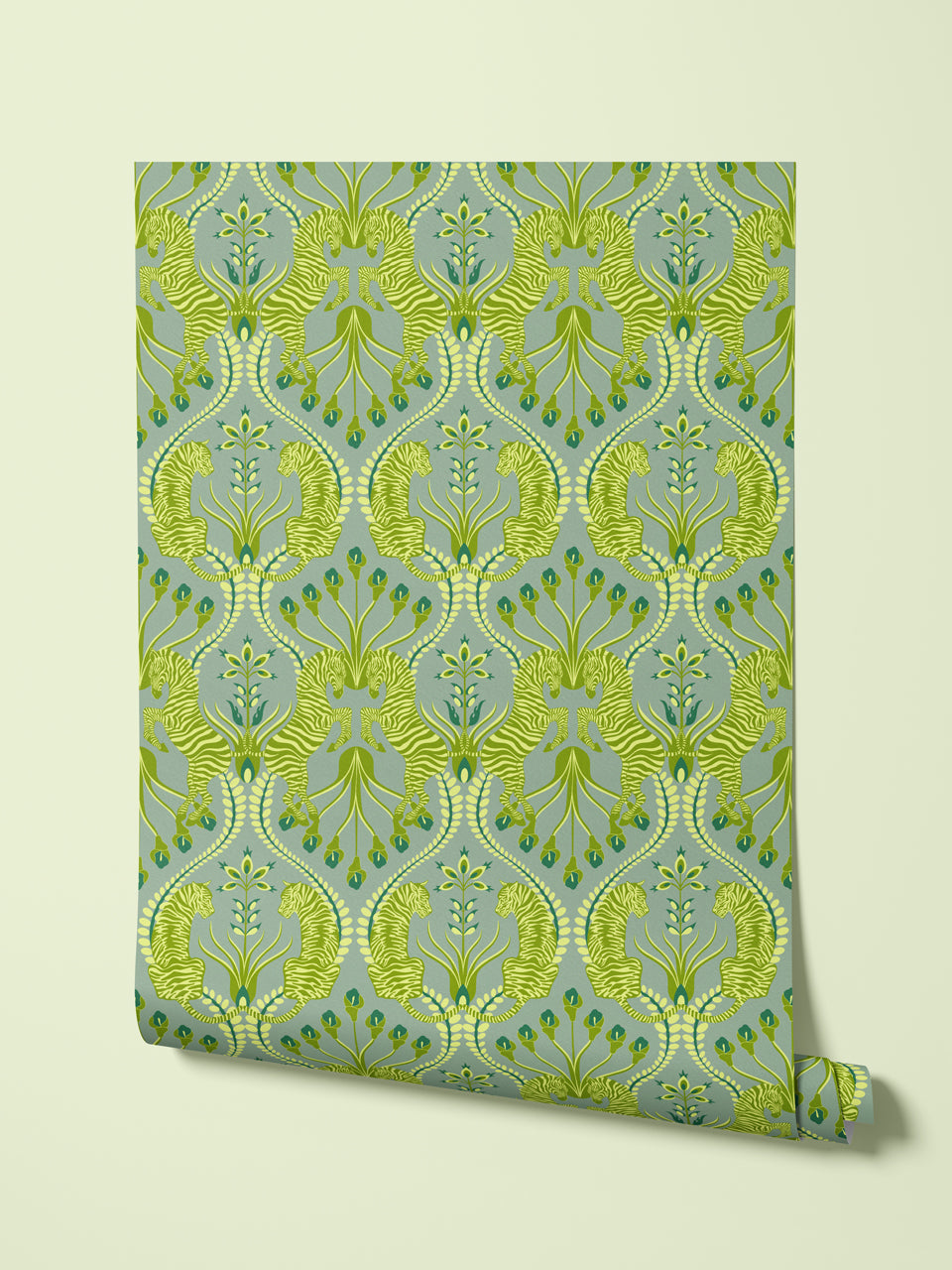 Hanging roll of Secret Garden Safari Green wallpaper showcasing folk-style tigers and zebras in a luxury olive and moss colourway.