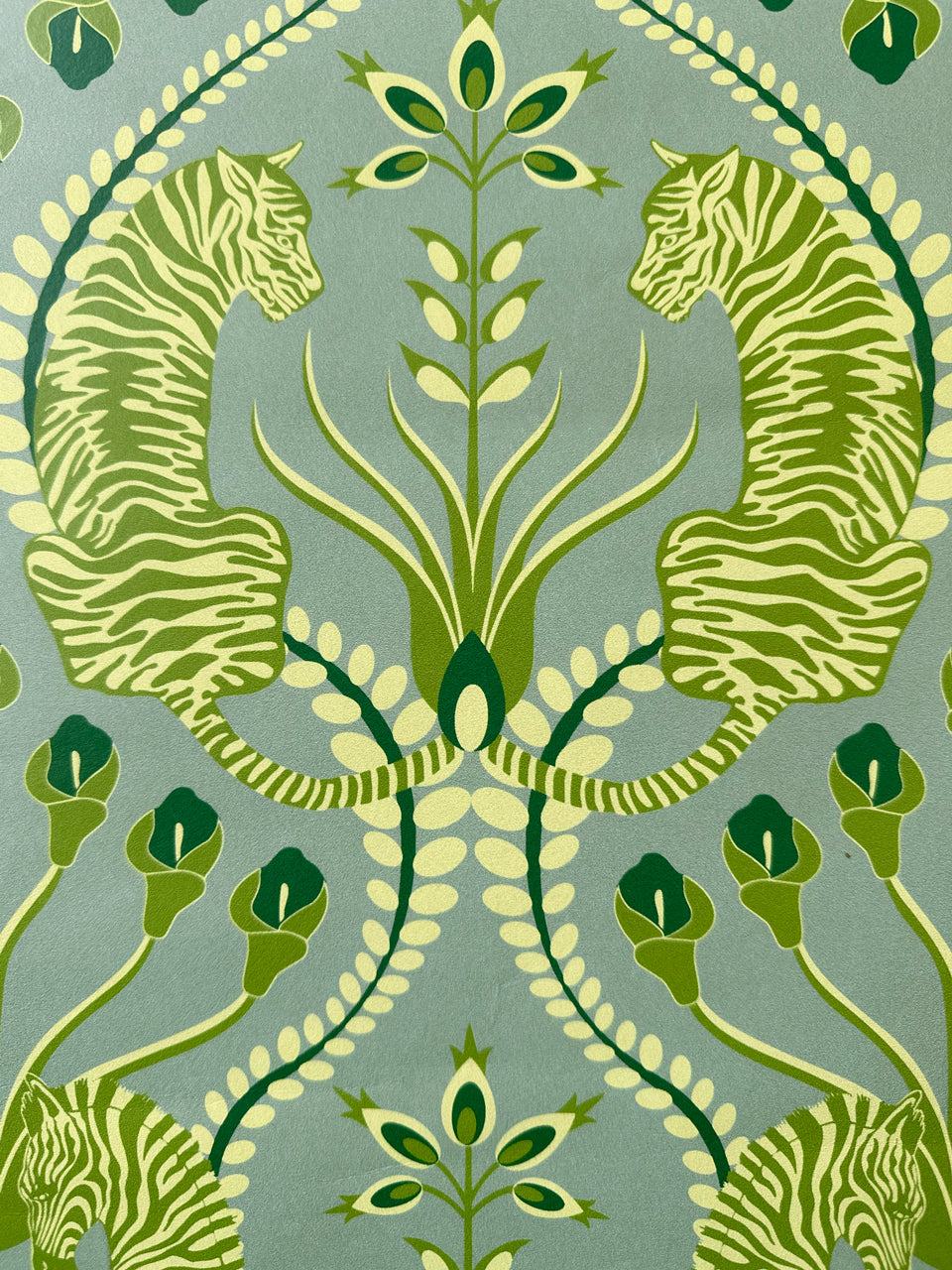 Statement tiger illustration on olive-toned background in Secret Garden Safari Green wallpaper with nature-inspired linework.