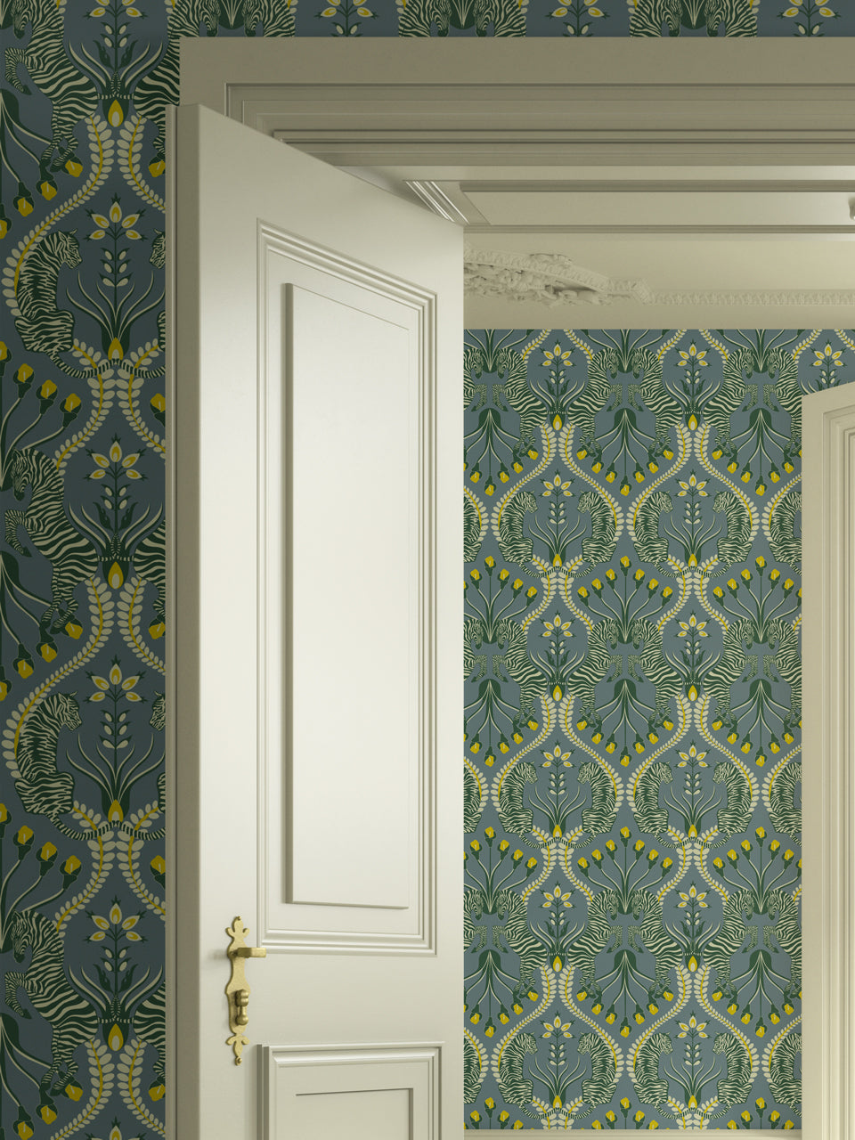 Grey bedroom featuring Secret Garden Safari wallpaper with botanical motifs and animal prints in ochre and eucalyptus.