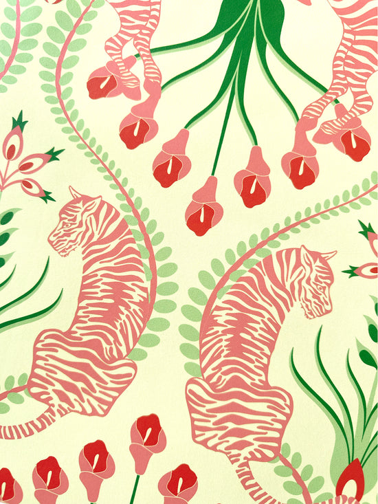 Statement wall with Secret Garden Safari Pink wallpaper featuring pink zebras, tigers, and lush botanical design.