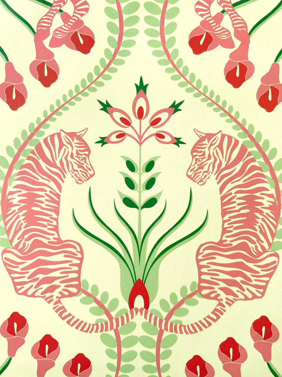 Soft colour palette detail of Secret Garden Safari Pink wallpaper showing blushing tigers and stylised green florals.
