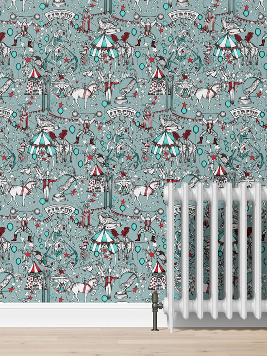 Circus-themed wallpaper with horses, performers, and tents on a teal background.