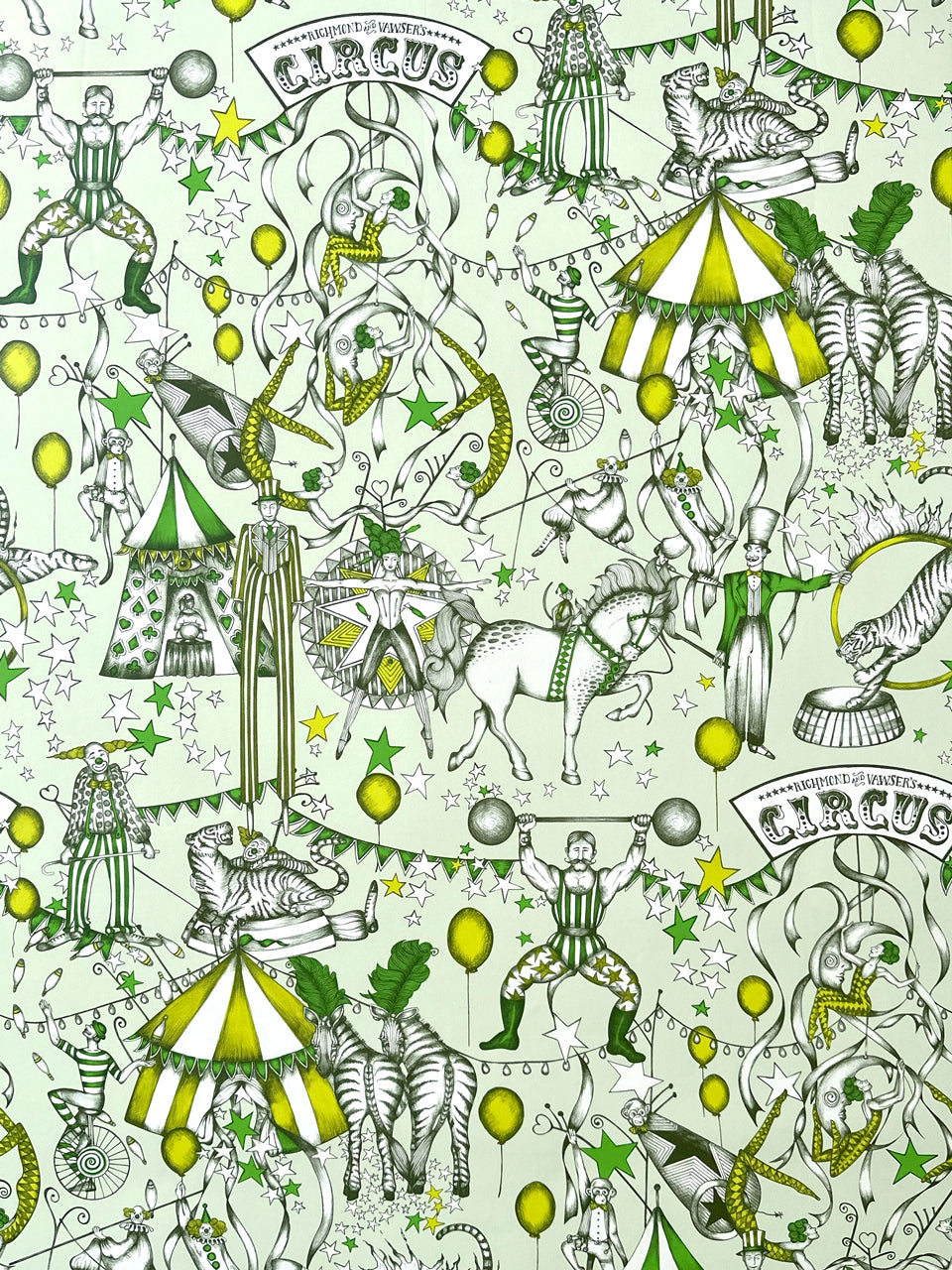 Full pattern repeat of The Greatest Show Citrus circus wallpaper in a lively yellow and green carnival colourway.