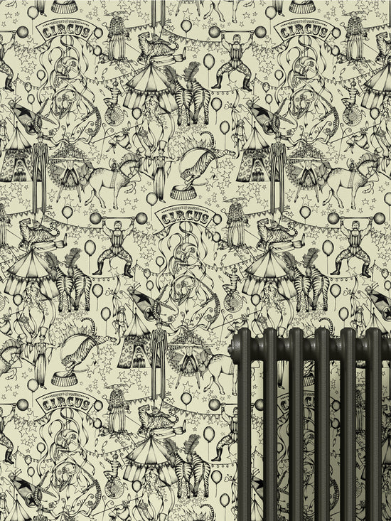 Patterned, circus theme ivory wallpaper featuring monochrome zebra, tiger and circus characters and radiator in foreground.