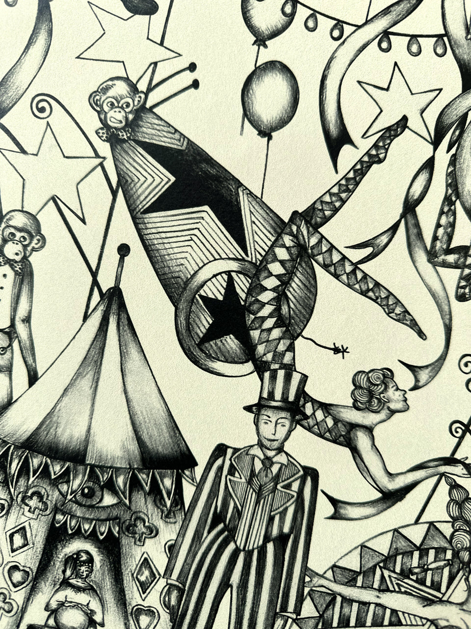 Circus wallpaper detail with ringmaster, acrobat, monkey in a cannon and horse on antique white wallpaper.