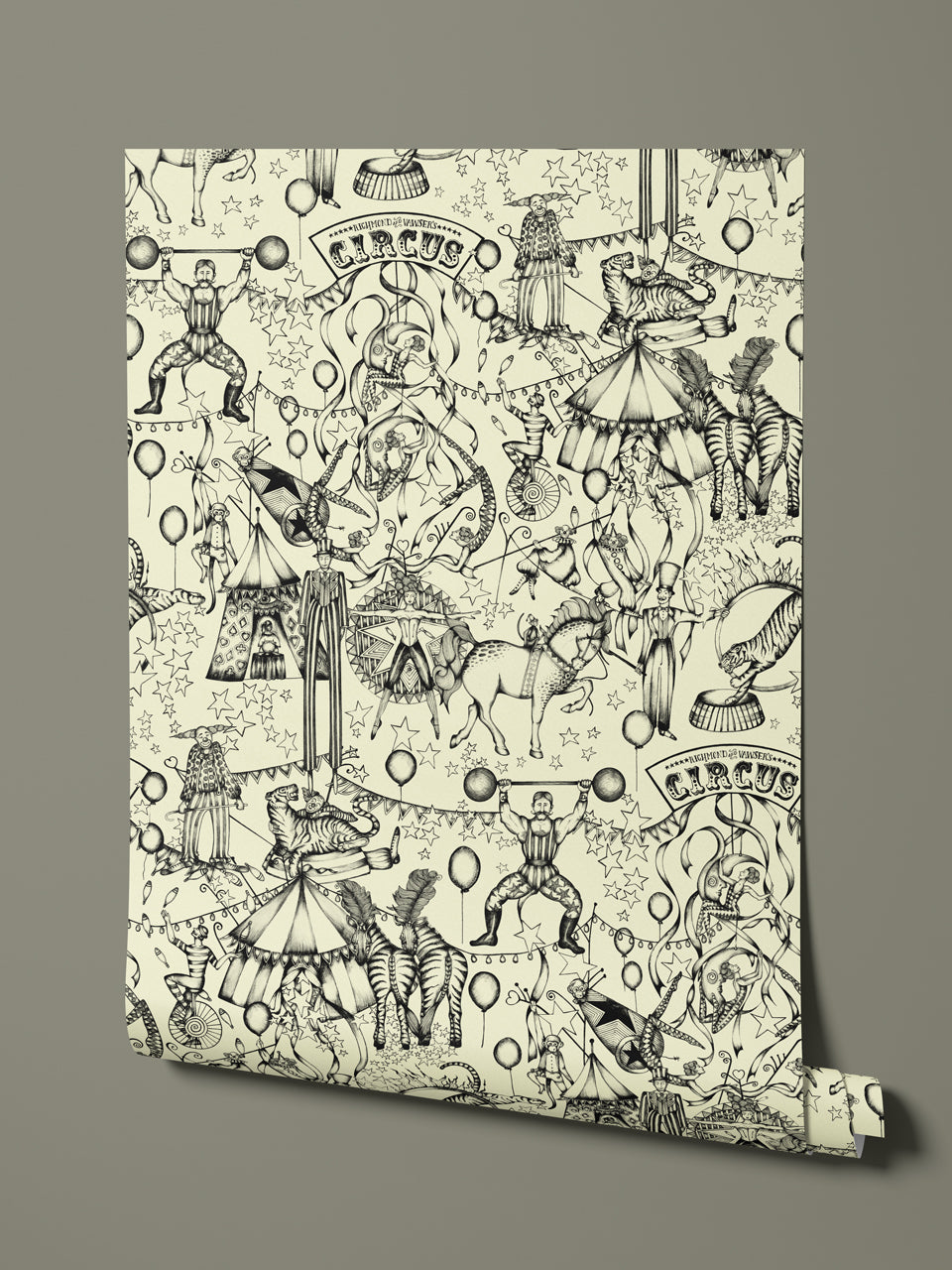 Hanging wallpaper roll showing full repeat of hand-drawn vintage circus design in monochrome.