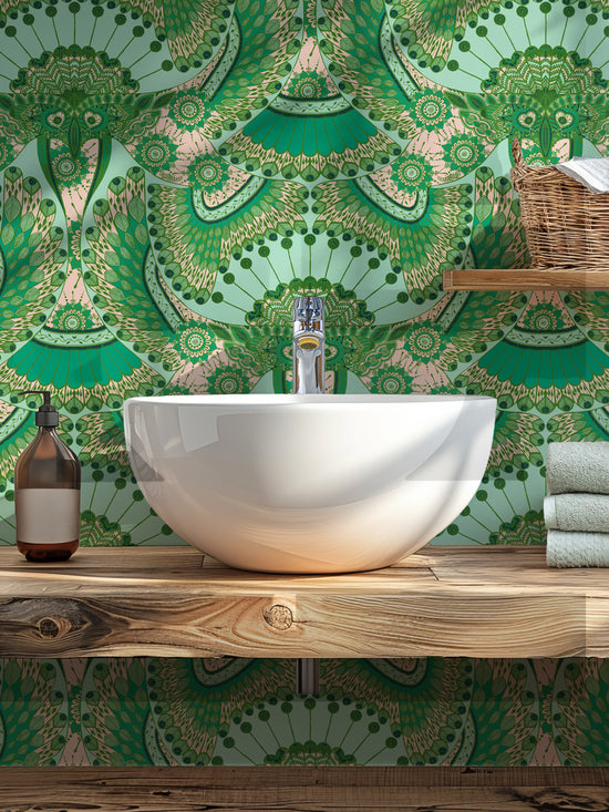 Eclectic bathroom interior with soft pink and green henna-style bird wallpaper for a vibrant statement.